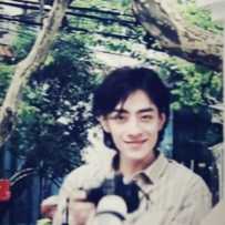 【单图】扛相机的小郑老师